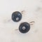 Black offset crystal hook earrings